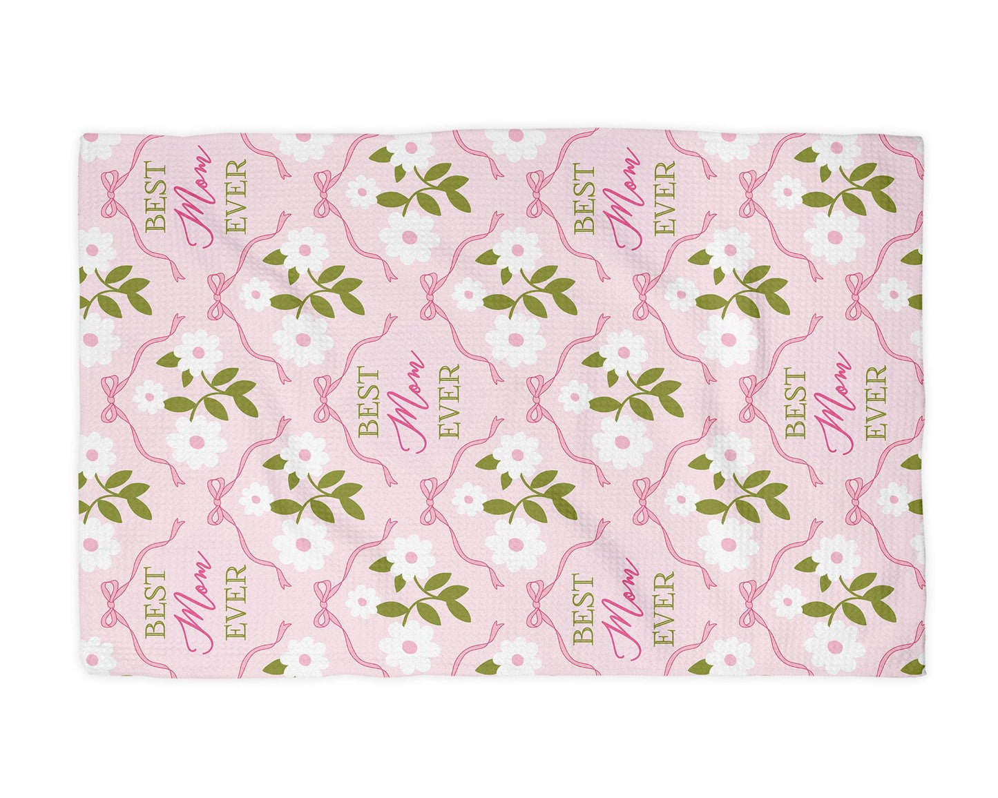 a pink and green towel with flowers on it