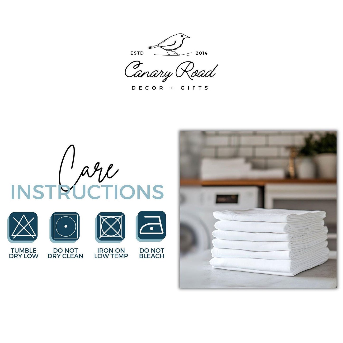 a stack of white towels sitting on top of a table