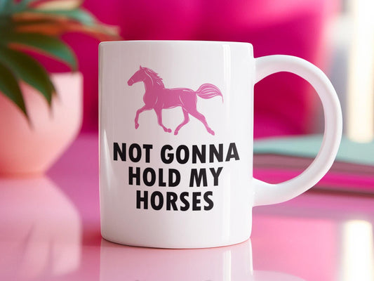a white coffee mug with a pink horse on it