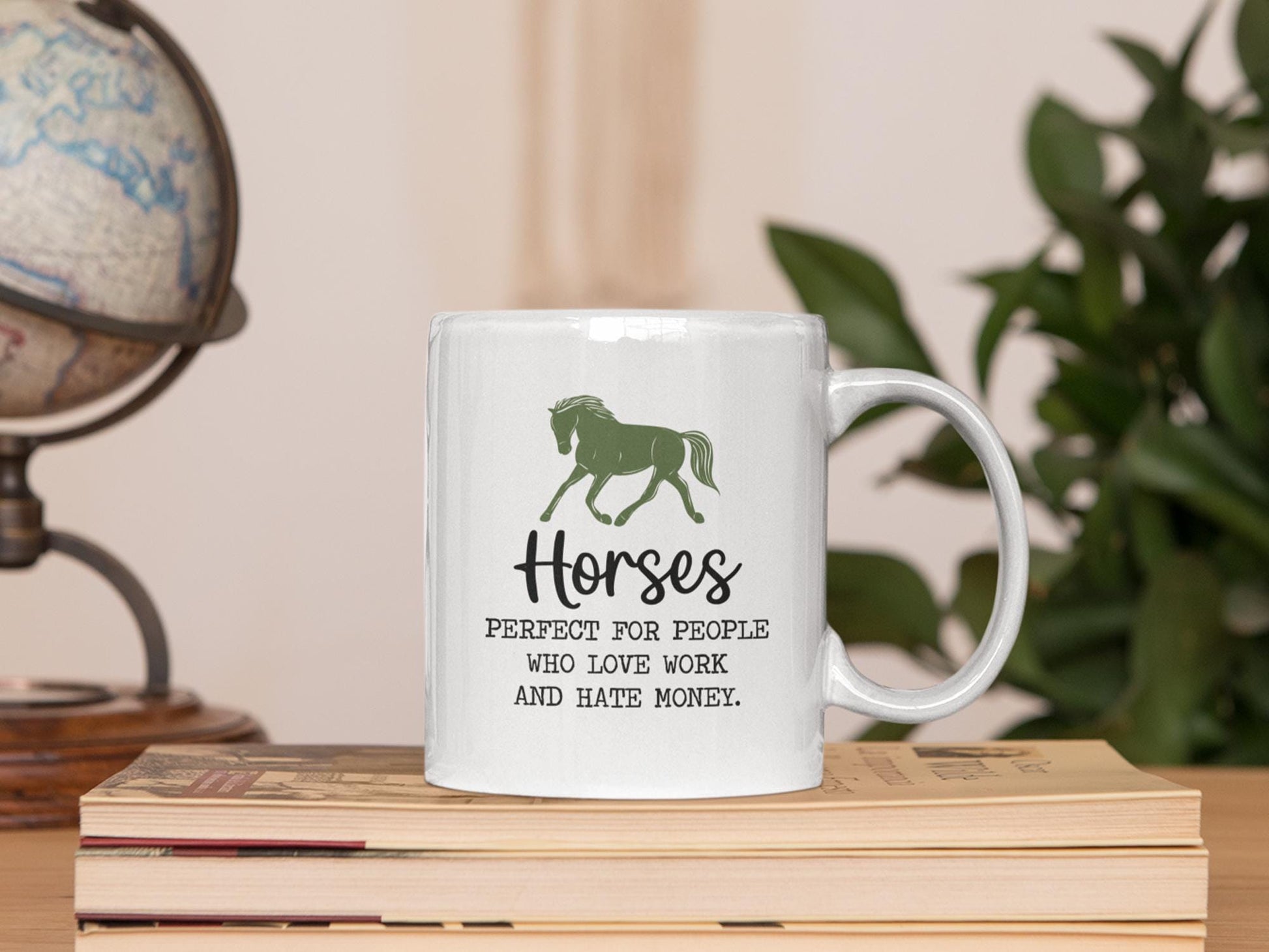 a white coffee mug sitting on top of a wooden table
