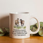 a white coffee mug with two horses on it